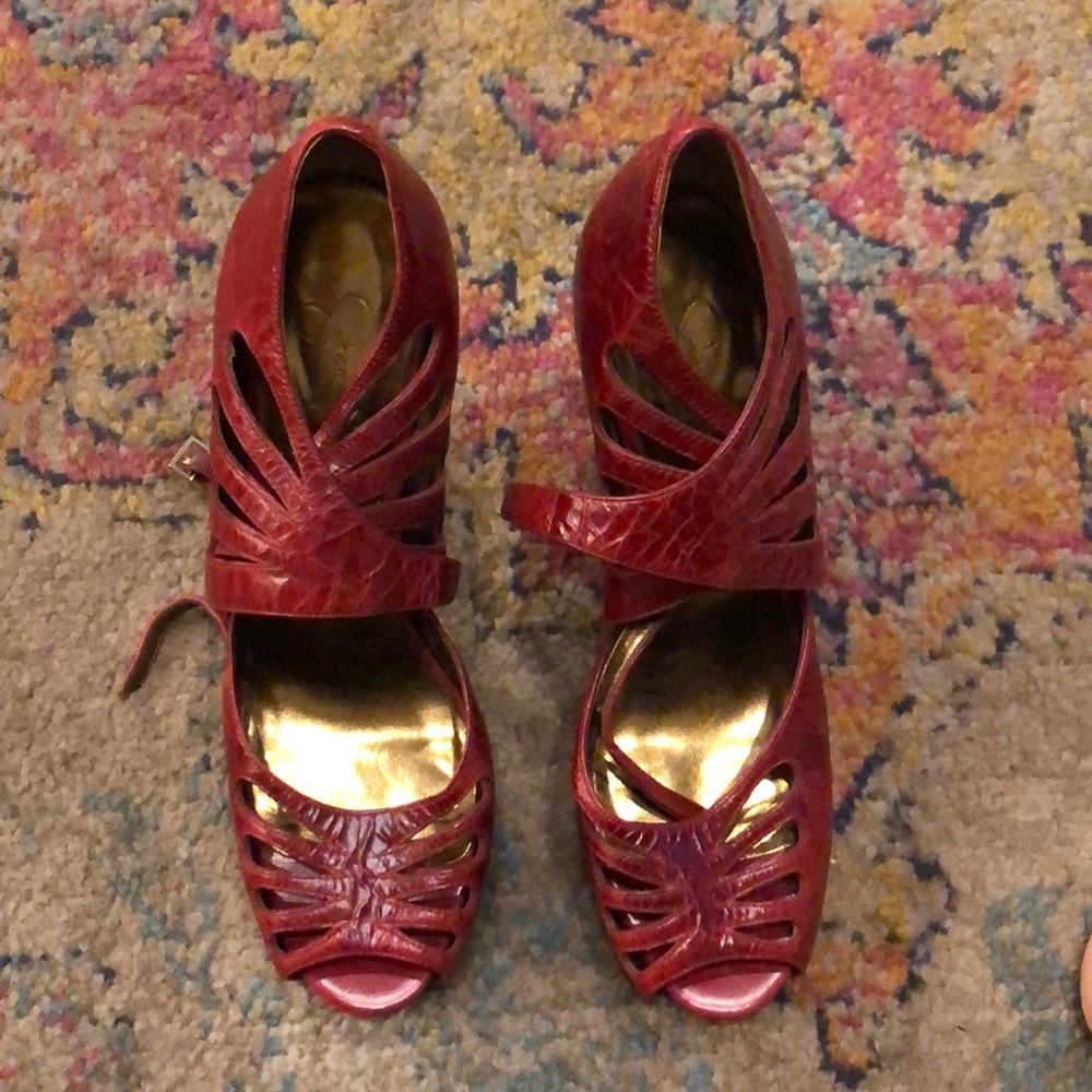 Used red leather 5 inch heels.